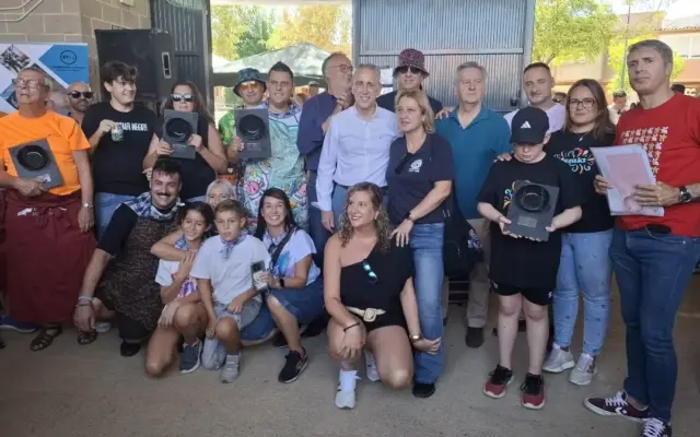 Colectivos participantes en el concurso de migas manchegas en la Plaza de Toros de Puertollano